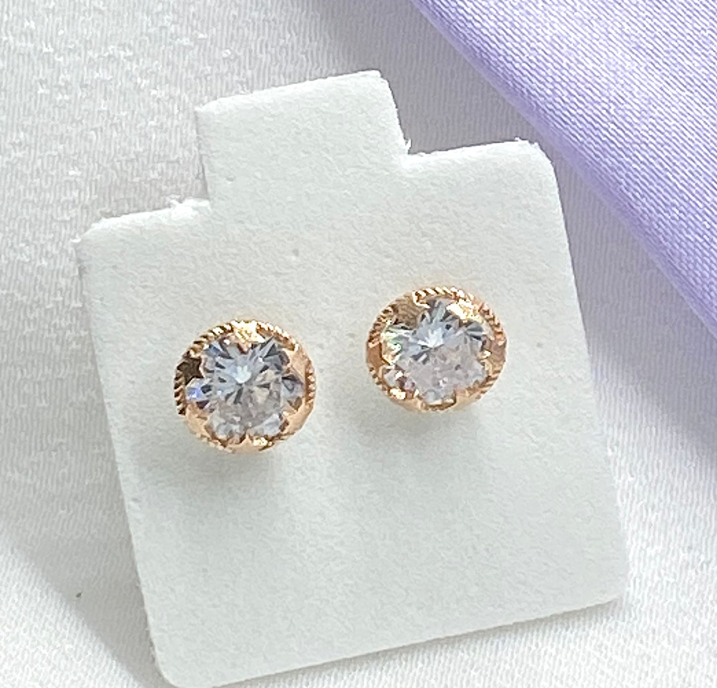 Aretes punto de luz rose