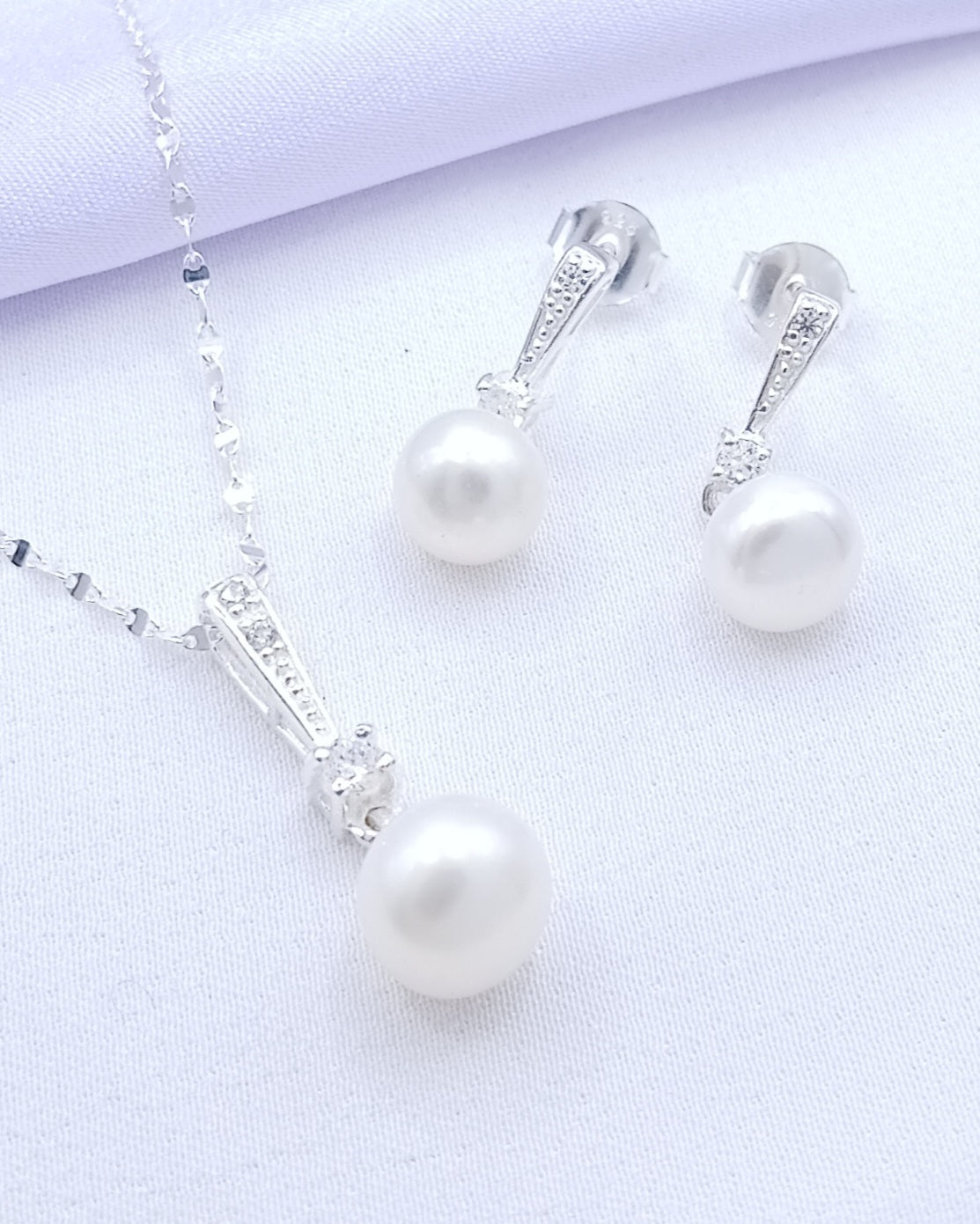 Set perla con punto de luz