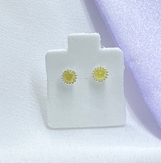 Aretes punto de luz amarillo