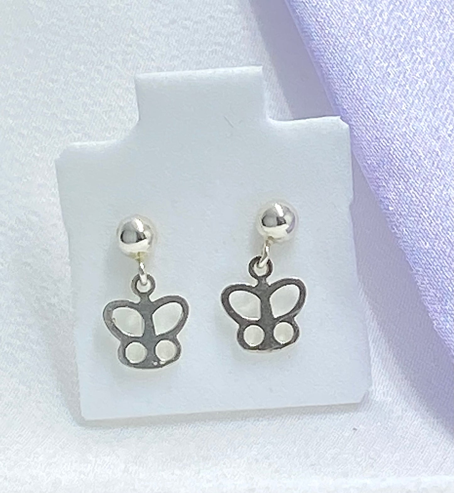Aretes mariposa silueta