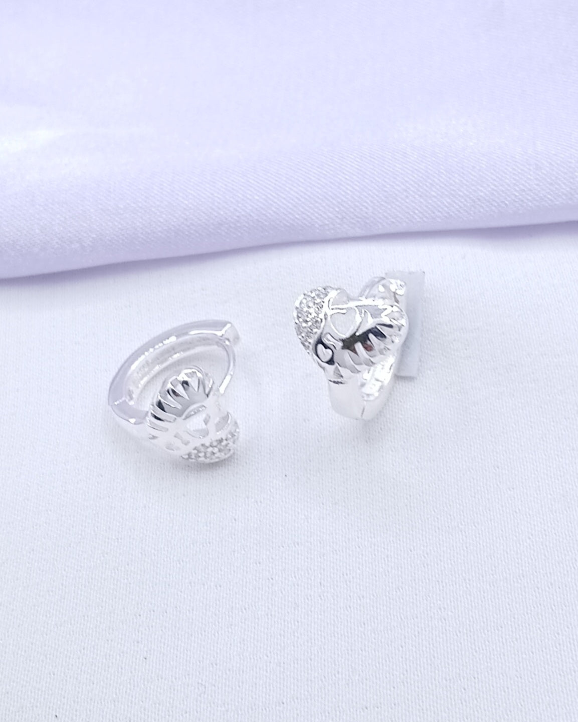 Argolla hugguie triángulo microzirconia