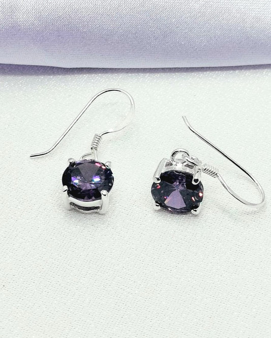 Aretes punto de luz lila