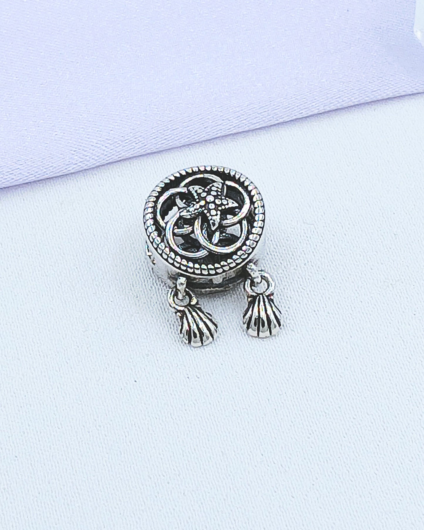 Dije charm estrella de mar