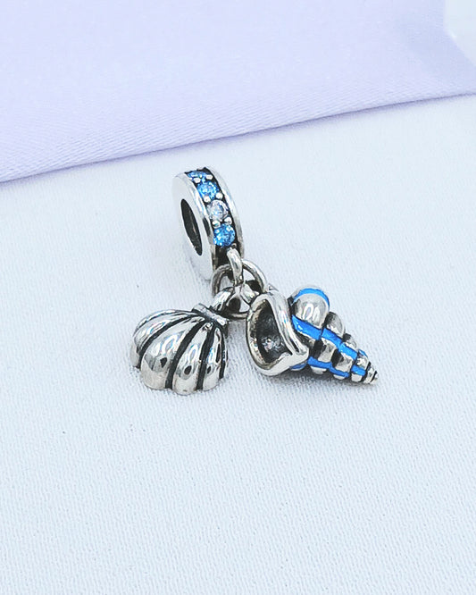 Dije charm caracol y concha de mar